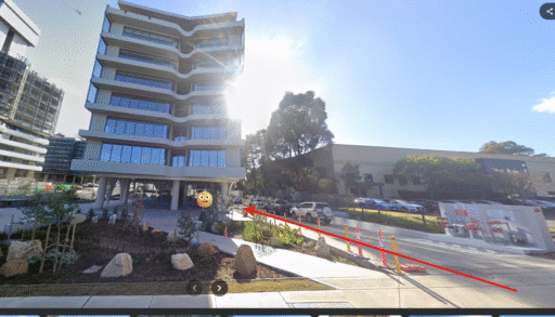 Entrance to Focus Health & Fitness in Norwest with driveway access and building front view