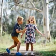 Children playing at Castle Hill Heritage Park playground in the Hills District, a family-friendly park with trails and open spaces