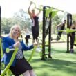Outdoor fitness park in the Hills District with exercise equipment, gum trees, and open grassy space for community workouts