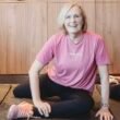 Adult with osteoporosis doing safe strength training with personal trainer in Norwest Hills District studio
